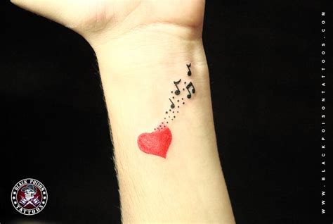 Stunning Musical Notes Tattoo - Black Poison Tattoos