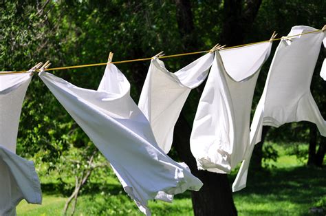 White clean laundry drying on the clothesline | Skyline Enterprises