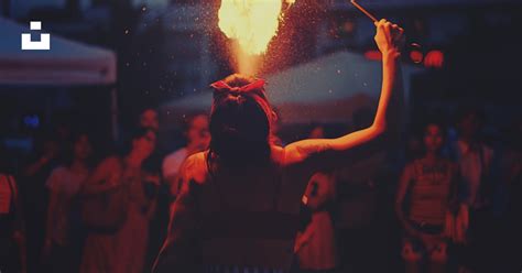 Woman performing fire spitting photo – Free Entertainment Image on Unsplash