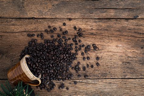 Coffee beans on the desk, top view 1363330 Stock Photo at Vecteezy