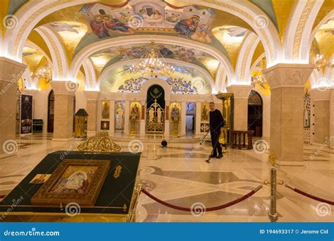 People Wahshing the Floor Behind Icons Inside of Saint Sava Temple ...