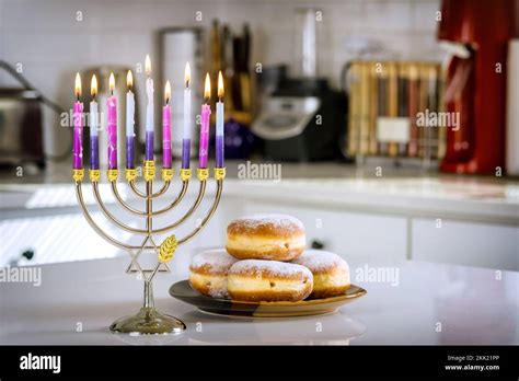 Lighting hanukkiah menorah candle is Jewish tradition that has been an ...