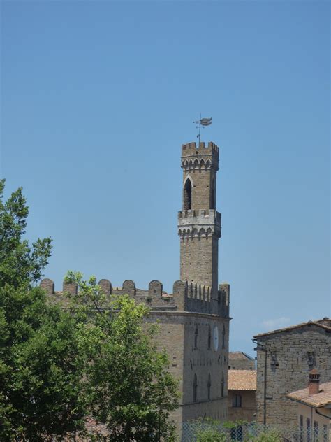 Etruscan Acropolis ruins in Volterra - Palazzo dei Priori and it's bell ...