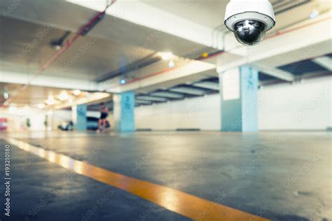 CCTV security camera observation and monitoring in the car parking ...