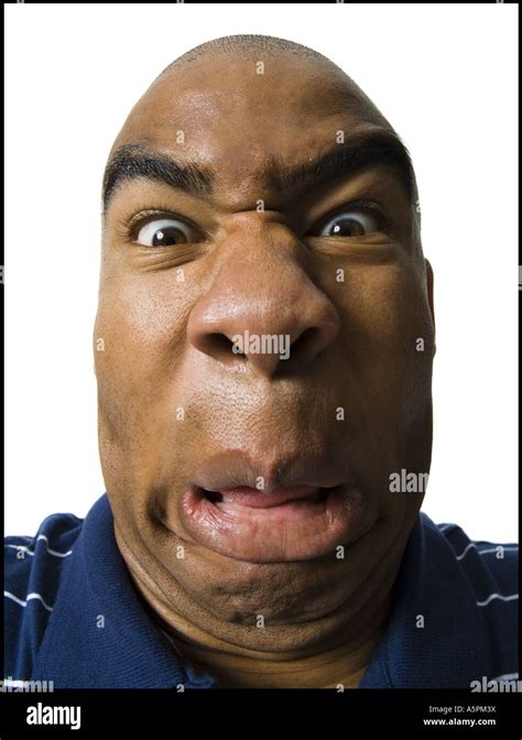 Man making a funny face Stock Photo - Alamy