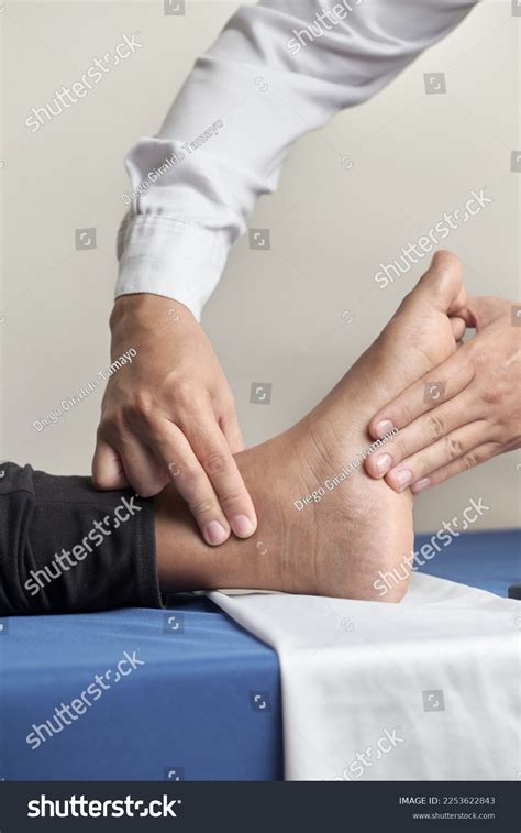 Nurses Hand Palpating Posterior Tibial Pulse Stock Photo 2253622843 ...