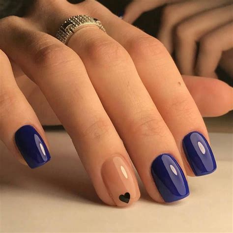 Beautiful Navy Blue nails with tiny Heart shape. pink nail polish on ...