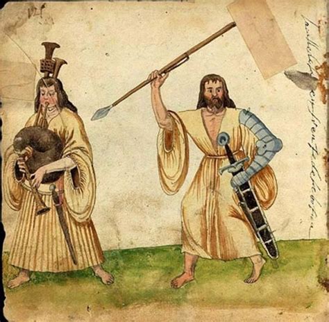 two men dressed in ancient clothing holding spears