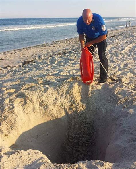 Thinking About Building A Hole In The Sand At The Beach? Don't ...