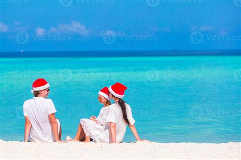 Christmas Family vacation on white beach 17712245 Stock Photo at Vecteezy