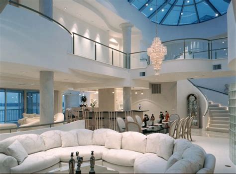 Majestic All White living room decor with semi circular sectional ...