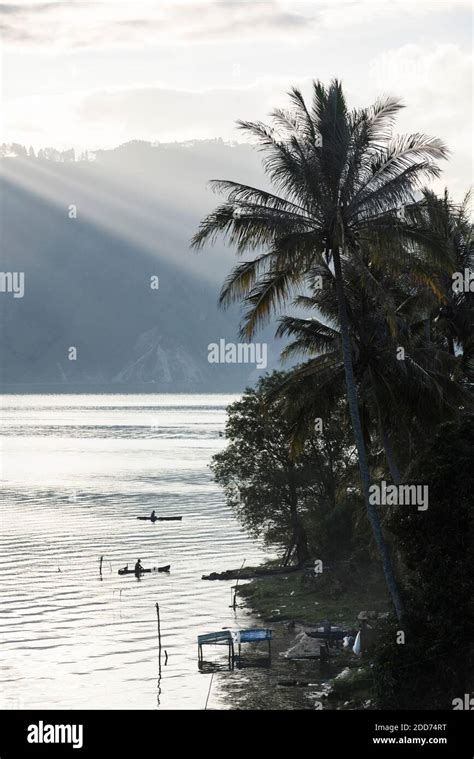 Fishing boats on Lake Toba (Danau Toba) at sunrise, North Sumatra ...