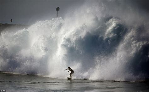 Surfers flock to Southern California beaches as Hurricane Marie churns ...