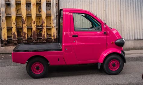 1996 Daihatsu Midget II - fuchsia | AdamsGarage - SODO-MOTO