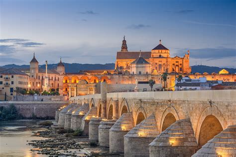 Cordoba, Spain at the Roman Bridge and Mosque-Cathedral - Facet Barcelona