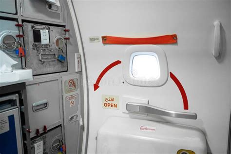 Emergency Exit Door in an Airplane Close Up Stock Image - Image of ...