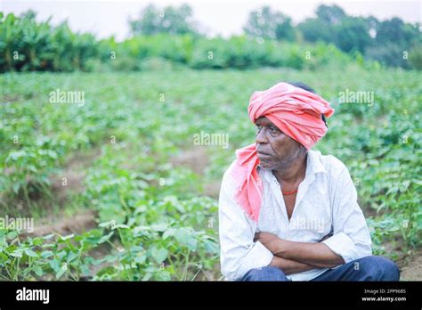 Indian poor farmer in farm, sad farmer, loss of farmer Stock Photo - Alamy