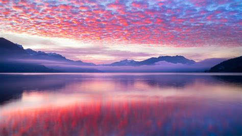 Nubes rosas reflejadas en lago Fondo de pantalla ID:5957