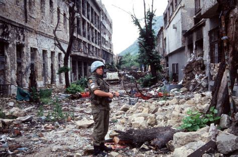 A Spanish U.N. soldier in a destroyed street of Mostar, Bosnia, 1994