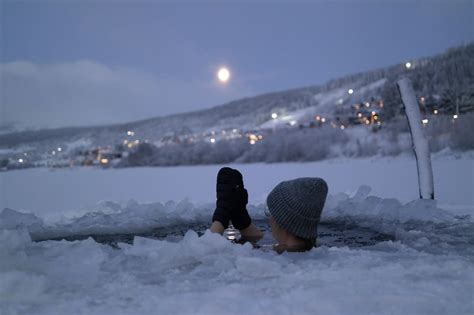 Winter Swimming in the Swedish Mountains - Adventure Sweden