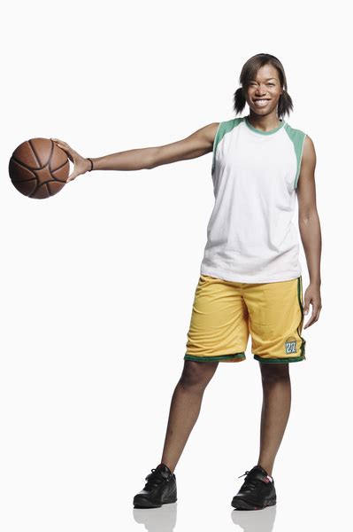 Young adult woman palming basketball Free Photo Download | FreeImages