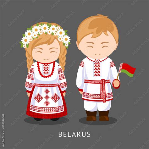 Belarusians in national dress with a flag. Man and woman in traditional ...