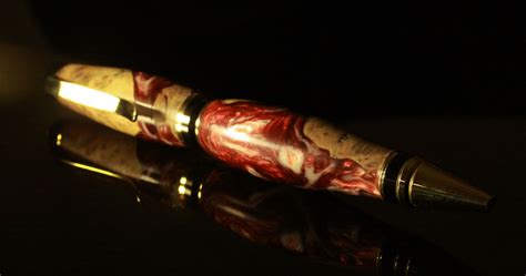 Twist style pen made of wood and acrylic combination. I call this one ...