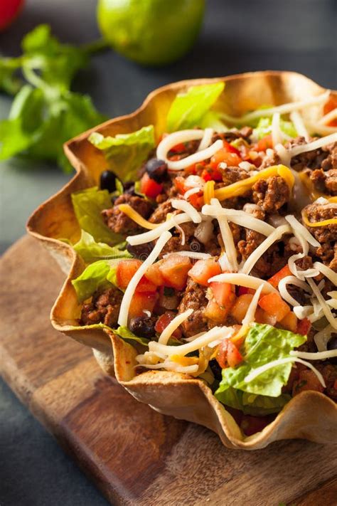 Taco Salad in a Tortilla Bowl Stock Photo - Image of chips, background ...