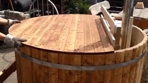 Wooden cover for hot tub-made of thermowood - YouTube