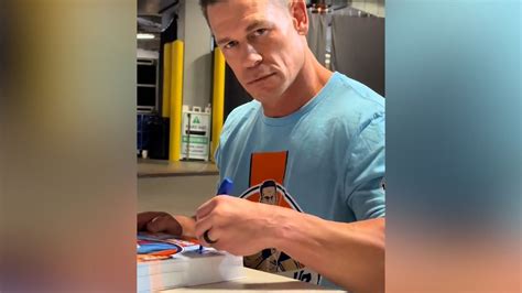 John Cena doesn't even need to look when signing autographs | indy100