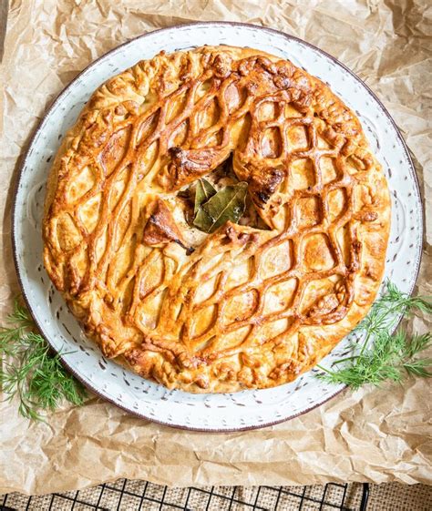 Puff Pastry Pie with Chicken and Leek Decorated with Dill. Top View ...