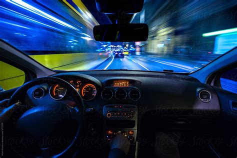 "Car Cockpit At Night" by Stocksy Contributor "Mark Korecz" - Stocksy