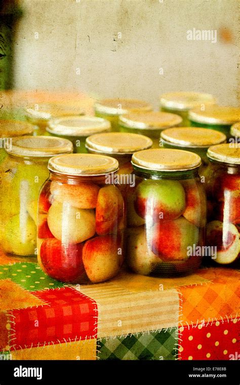 Jars of homemade fruit preserves - vintage photo Stock Photo - Alamy