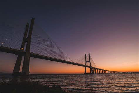 Vasco da Gama Bridge at Sunset · Free Stock Photo