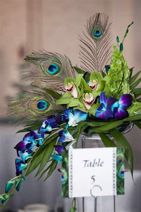 Pin by Wedding Boards on floral arrangements | Peacock wedding ...