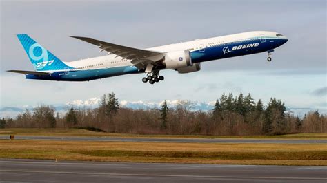 Boeing 777-9X, the world's largest twin-engine plane, takes its first ...