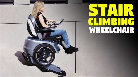 Stair-climbing wheelchair that carries disabled and elderly people on ...