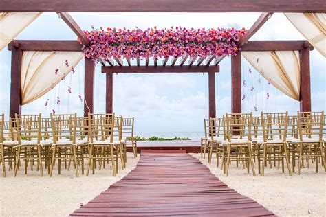 Beautiful and floral wedding here at Breathless Riviera Cancun! # ...