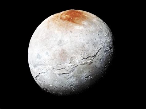 How Pluto’s Moon Charon Got Its Dusty Red Cap | WIRED