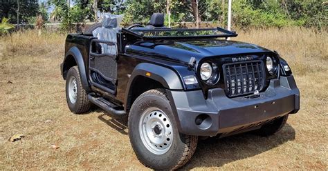 Mahindra Thar 4X4 SUV modified as an open-top Willys jeep - Car Fix Guru