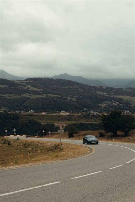 Car on a Mountain Road · Free Stock Photo