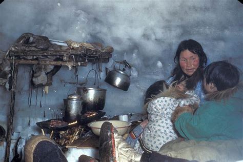 Inside a native family's igloo. Arviat (formerly Eskimo Point), Nunavut ...