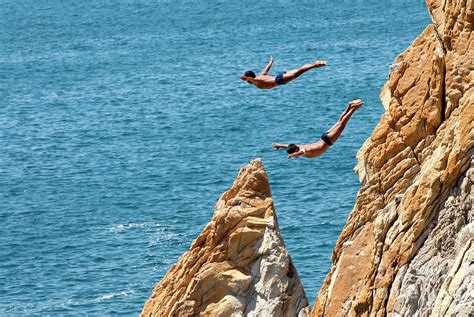 Famous cliff diver of Acapulco Mexico Photograph by Anthony Totah ...