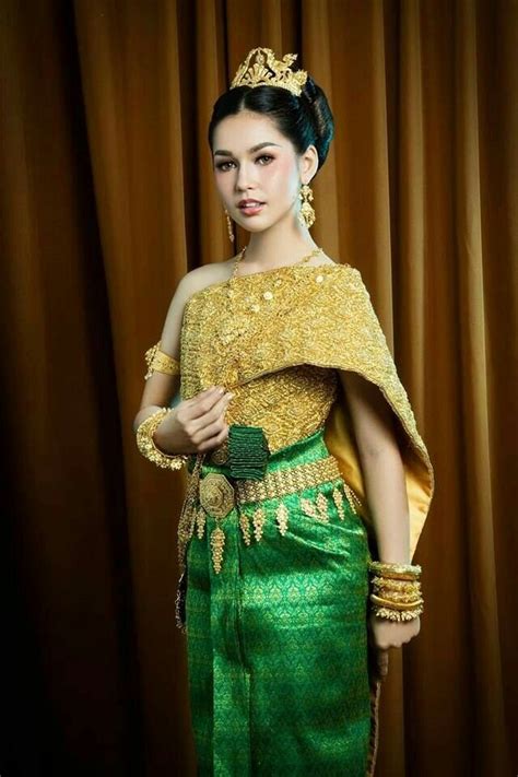 Beautiful Khmer girl in Cambodia traditional costume. She smile and ...