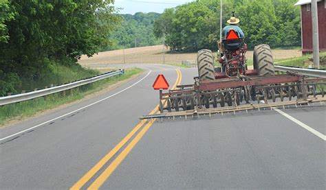 Slow Moving Vehicle sign saving lives for 50 years - Farm and Dairy