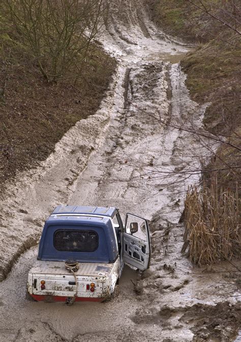 Car Stuck in Deep Mud - Matt Norman