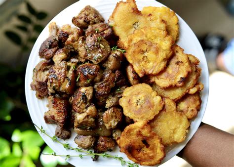 Baked Haitian Pork Griot and Crisp Tostones - Travelandmunchies