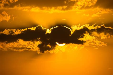 Sun Hiding Behind Clouds · Free Stock Photo