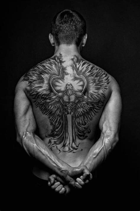 The Coolest Back Tattoos for Men | Back tattoos for guys, Wing tattoo ...