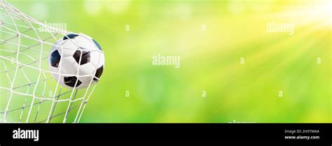 Soccer ball in the net of a goal. Soccer concept Stock Photo - Alamy